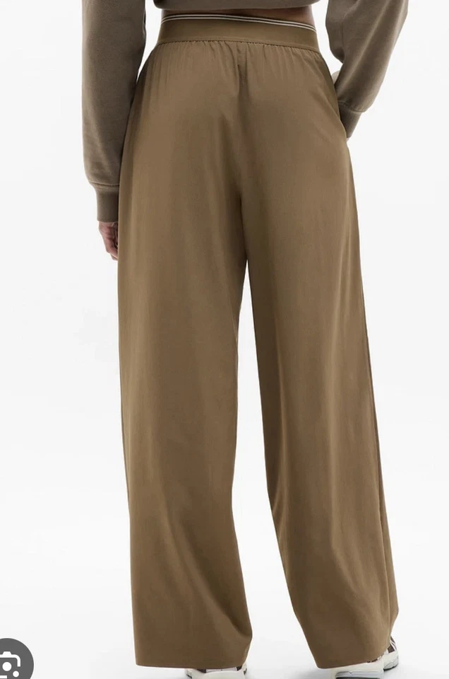 Pantalón Athleta Stratosphere Pierna Ancha Talla S- Cintura 28 pulgadas, Entrepierna 31 en Marrón. Nuevo Foto 1 de 4