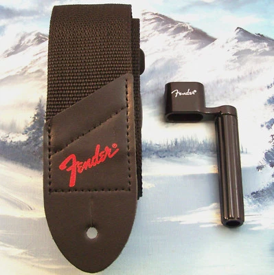 GUARDABARROS GENUINO ~ CORREA DE GUITARRA CON LOGOTIPO ROJO + BOBINADORA DE CUERDAS Foto 1 de 2