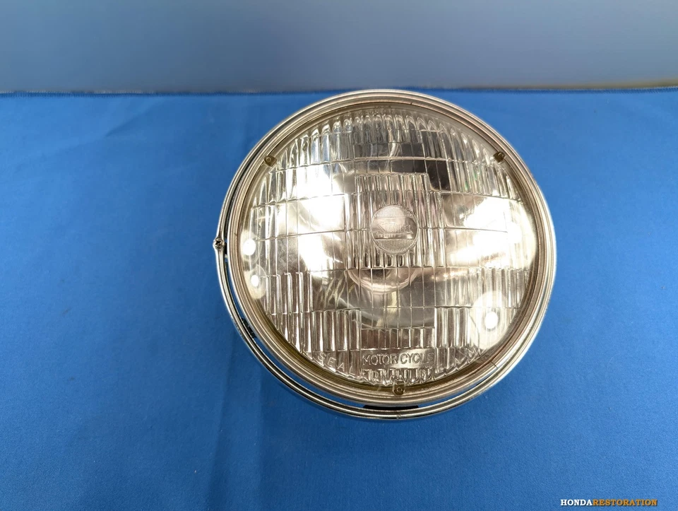 Unidade de farol NOS Honda CB750C/CB900C 33100-425-671 original do fabricante - Imagem 1 de 4