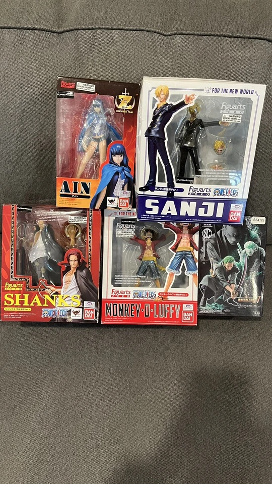 LOTE DE 5 NUEVOS Figuras Bandai Shanks, Luffy, Sanji, Ain Figuarts CERO PIEZAS Foto 1 de 2