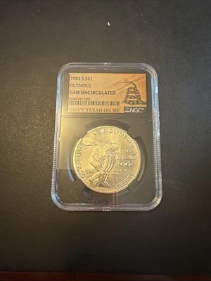 1983 S $1 LA Commerative Olympic Discus Thrower Silver W/Don't Tread on Me SNAKE - Image 1 of 4