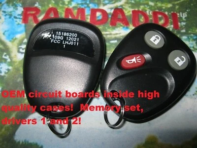 Set 2 OEM GM 15186200 15186201 Fob Remote Transmitter LHJ011 Clean OEM Cases - Image 1 of 4