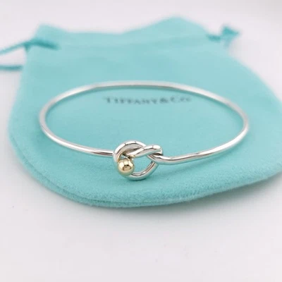 Pulsera Tiffany & Co. Plata de Ley y Oro 18k Gancho Ojo Amor Nudo Pretzel 6.5 Foto 1 de 4