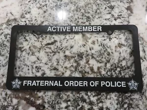 Fraternal Order Of Police License Plate Frame Black Plastic 12" x 6" NEW - Foto 1 di 2