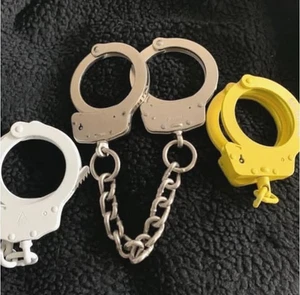 Lots of 3 pcs Handcuff Cast Working Lock With white ,yellow ,silver color replic - Picture 1 of 3