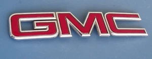 GMC EMBLEM RED/ CHROME OEM REAR BADGE 7 5/8" WIDE X 1 5/8" HIGH TRUCK SUV? - Picture 1 of 3
