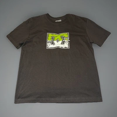 Camiseta Y2K DC Shoes 2000s Y2K vintage DC Shoes camiseta gráfica descolorida Foto 1 de 3
