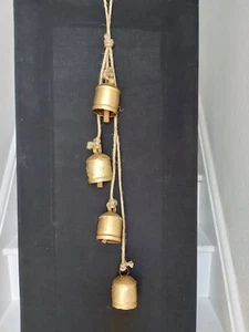 FOUR HANDMADE LARGE IRON INDIAN COW BELLS HANGING ON A THICK JUTE ROPE - Picture 1 of 13