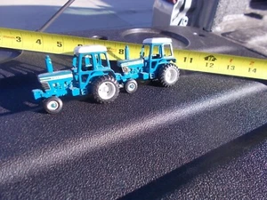 Paar bespielte mit Ertl Ford 9700 Traktoren Maßstab 1/64. - Bild 1 von 10