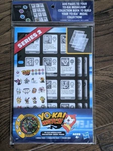 YO-KAI UHR HASBRO MEDAILLE / MEDAILLENSAMMLUNG BUCHSEITEN SERIE 2 - NEU! - Bild 1 von 2