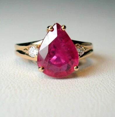 3Ct Pear Cut Lab Created Pink Ruby Three Stone Bridal Ring 14k Rose Gold Plated - Image 1 of 4