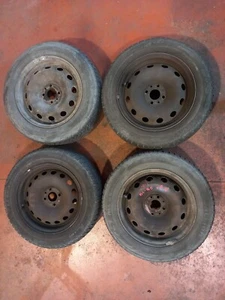 N.4 CERCHI FERRO FIAT 4 FORI - 15" - 6,5J 15H2 ET43 USATI + GOMME BL-B5 - Picture 1 of 11