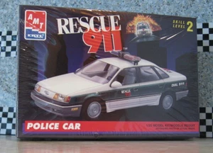 Ford Taurus Police Car Rescue 911 AMT/Ertl Kit 6417 sellado de fábrica escala 1:25 - Imagen 1 de 6