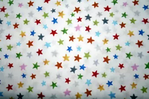 MULTICOLORED STARS FROM IN THE BEGINNING FABRIC - 100% COTTON FABRIC - Picture 1 of 3