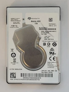 ST1000LM035, PN: 1RK172-071, SN: WL1M42LY, WU, FW: LCM2, Seagate 1Tb 2.5" HDD - Imagen 1 de 2