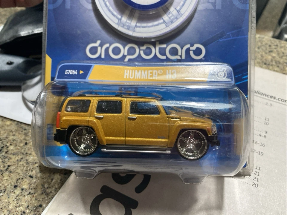 Hummer H3 Gold Hot Wheels Dropstars 1:50 Street Profile RR Phat Lip Diecast MOC - Image 1 of 4