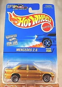 1996 Hot Wheels Blue/White Card #605 MERCEDES 2.6 Gold w/Chrome Lace Spoke Wheel - Picture 1 of 5