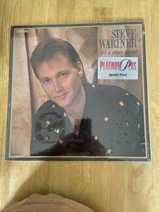 Steve Wariner  It'S A Crazy World Lp Record Album Vinyl 33 - Picture 1 of 4