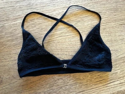 Bralette íntimo sin forro Free People negro M/L cierre frontal cruzado trasero nuevo sin etiquetas Foto 1 de 2