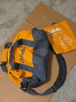 Bolsa de Lona Cabela's Ripcord 24 Litros Pequeña Dorada 18x9x9 Ligeramente Usada Estado Foto 1 de 4