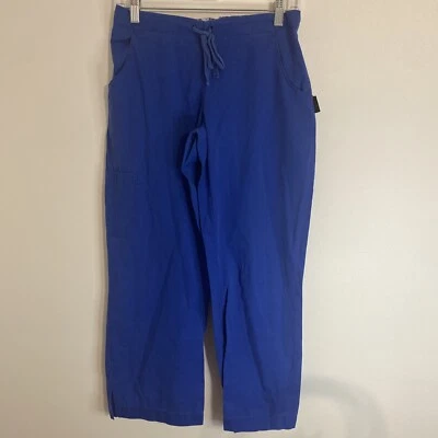 Pantalones pequeños con cordón de uniforme médico azul real con parte inferior exfoliante Peaches Foto 1 de 4