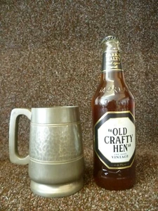 A VINTAGE ONE PINT CAPACITY HAMMERED PEWTER TANKARD. A VINTAGE PEWTER TANKARD - Picture 1 of 7