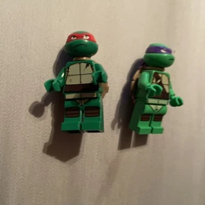 Lego Rafael & Donatello Minifigure Tartarughe Ninja Adolescenti Usato Buone Condizioni - Foto 1 di 3