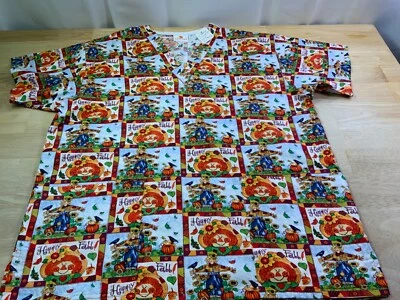 Nueva Blusa Médica para Mujer Melocotones Talla S dice Feliz Otoño —Espantapájaros en Parche de Calabaza* Foto 1 de 4