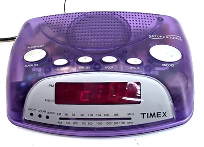 Radio reloj despertador Timex T235P púrpura translúcido sonidos de la naturaleza AM/FM Foto 1 de 4