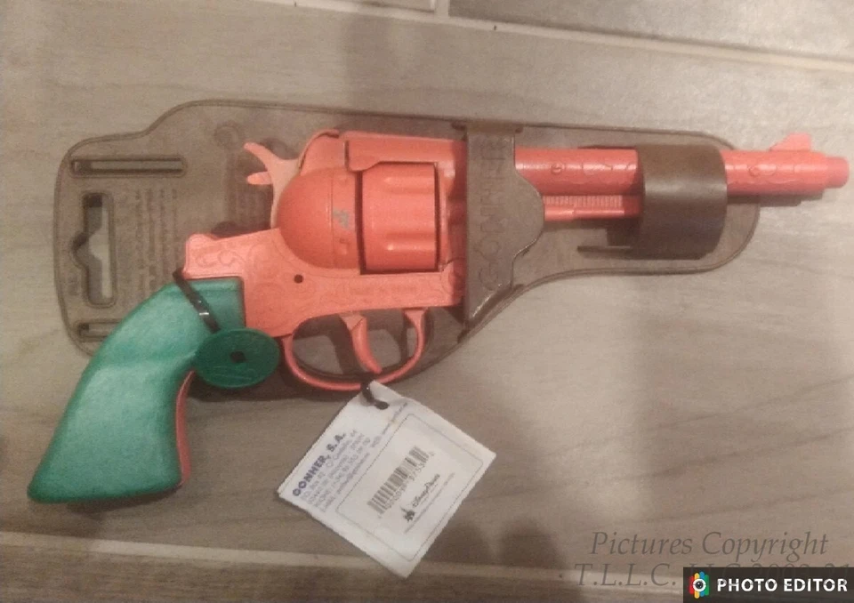 NEW VINTAGE WALT DISNEY WORLD #55 GONHER REVOLVER TOY CAP GUN W/HOLSTER - Image 1 of 3