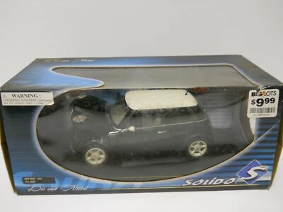Solido 1/18 New mini 2001 Ref 8080 DC-12 Black and White - Image 1 of 4