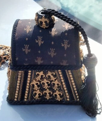 Bolso de mano para mujer estilo único raro marrón/dorado flor de lis con borla  Foto 1 de 3