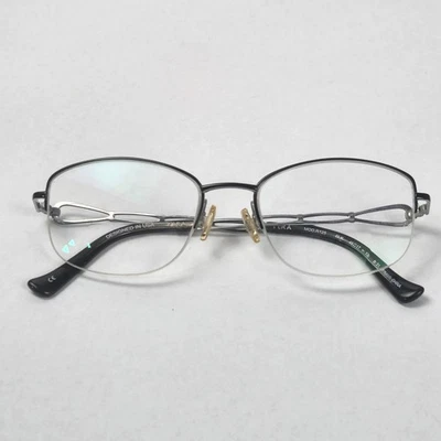 TURA R125 серебро/черный женщин овальный половина ободка очки 48-17-130 B:31 GUC - Изображение 1 из 4