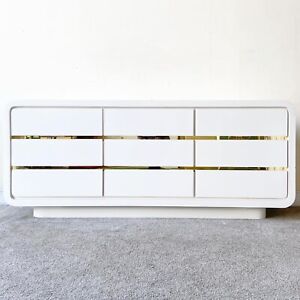 Postmodern White Lacquer Laminate Waterfall Dresser With Gold Accents 