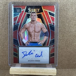 2024 Panini Select WWE Signature Selections Red Prizm /99 Julius Creed Auto - Picture 1 of 3