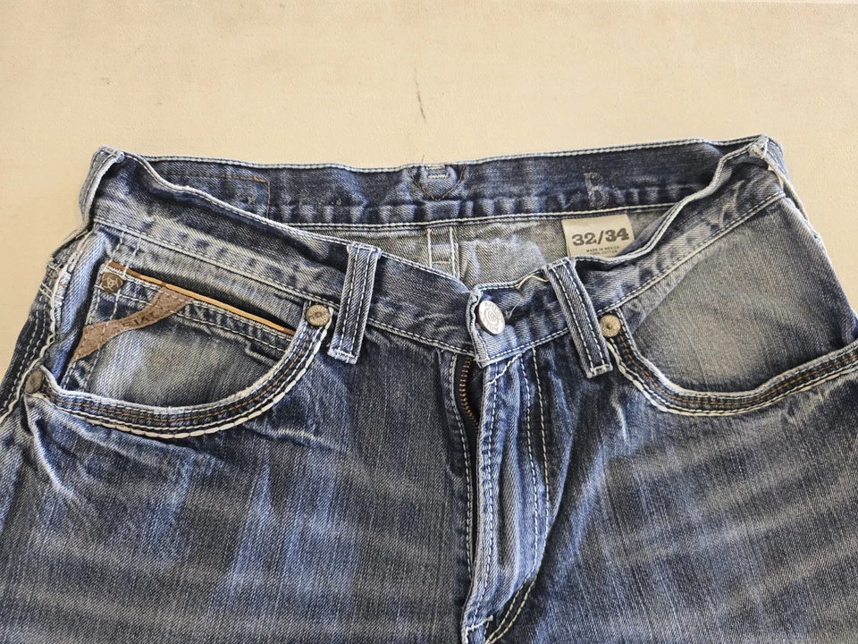 Pantalones de mezclilla Ariat para hombre talla 32/34 corte bota Foto 1 de 3