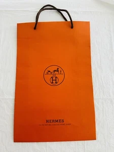 Auténtica bolsa de compras de papel naranja Hermes mango de cuerda 17”x 11”x 4” - Imagen 1 de 5