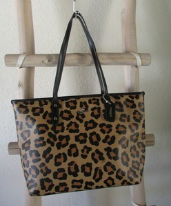 Las mejores ofertas en Bolsas de mano con cremallera Coach Ocelot y bolsos  para Mujer | eBay