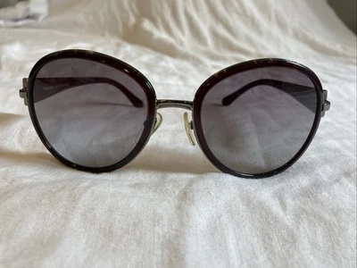 Gafas de sol redondas de gran tamaño Prada usadas en excelente estado marco borgoña protección UV Foto 1 de 4