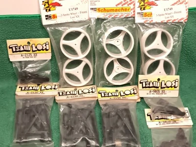 Lote de piezas de radiocontrol vintage Team Losi XX 2x2 Buggy escala 10 ruedas delanteras Schumacher TL Foto 1 de 4