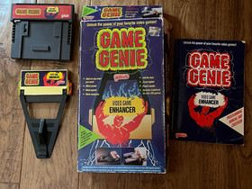 1990 Game Genie by Galoob for Nintendo NES with enhancer, box, manual, cartridge