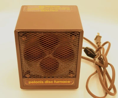 Horno de Disco Pelonis 1500W Cerámica Portátil Calentador de Espacio/Ventilador Marrón Probado Foto 1 de 4