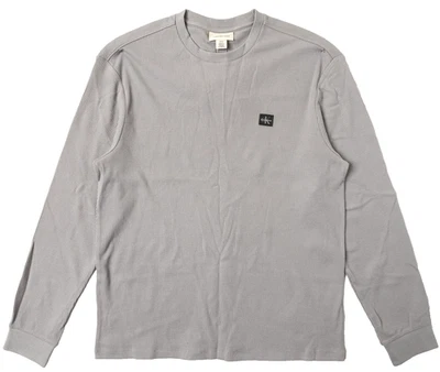 CAMISETA CALVIN KLEIN NUEVA CON ETIQUETAS PARA HOMBRE MANGA LARGA INSIGNIA GOFRE CUELLO REDONDO talla M GRIS FORMAL Foto 1 de 4