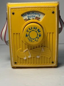 Radio de bolsillo con caja de música de cuerda FISHER-PRICE #758 The Mulberry Bush 1970 - funciona - Imagen 1 de 9