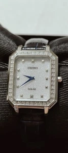 Seiko Ladies Conceptual Solar Crystal's Accent Silver Dial Watch SUP429P1 NEW - Picture 1 of 21