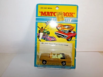 MATCHBOX S/F NO.  69-A ROLLS-ROYCE SILVER SHADOW GOLD BODY,  BLACK BASE MIBLISTE - Image 1 of 4