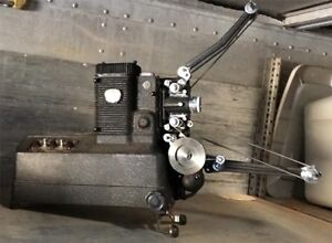 Vintage Ampro 1954 optical sound & silent Movie projector 16mm & 3 movies     