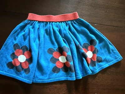 3/4 迷你紧身蓝色裙,五颜六色的绽放,松紧腰 — 第 1/4 张图片