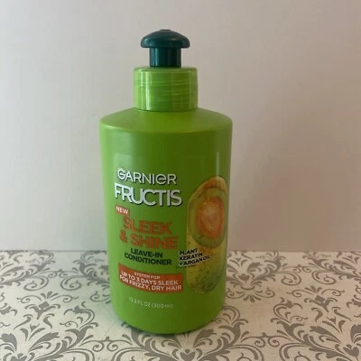 Garnier Fructis Acondicionador sin enjuague elegante y brillante con aceite de argán, 10,2 fl oz Foto 1 de 4