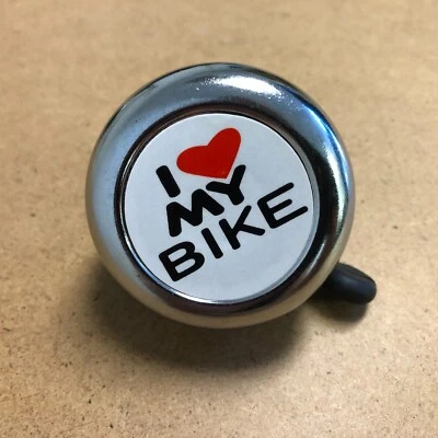 New NUVO Bicycle Bike Bell With I LOVE MY BIKE Print Silver/White Foto 1 de 3